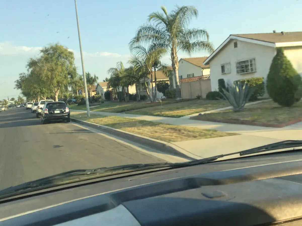 Service van arriving on a Pasadena, CA street — local same-day coverage